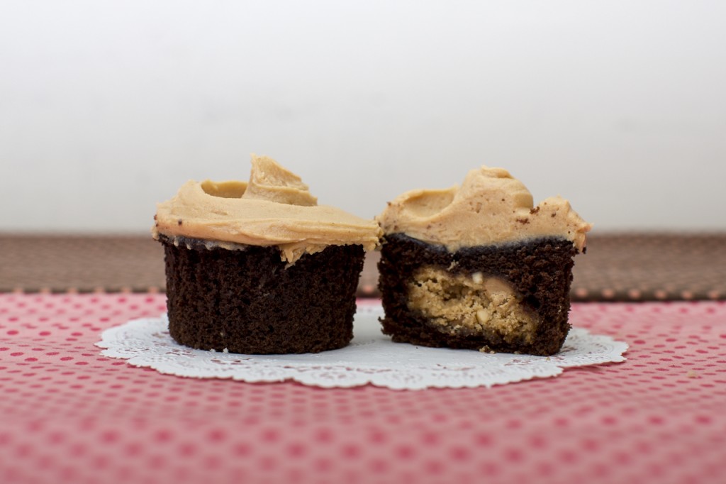 Devil’s Food cupcake with peanut butter cookie inside topped with peanut butter frosting