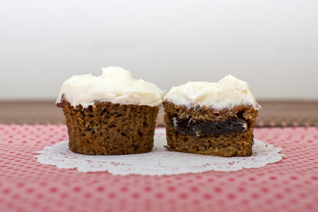 Carrot cupcake with gingersnap inside topped with vanilla cream cheese frosting